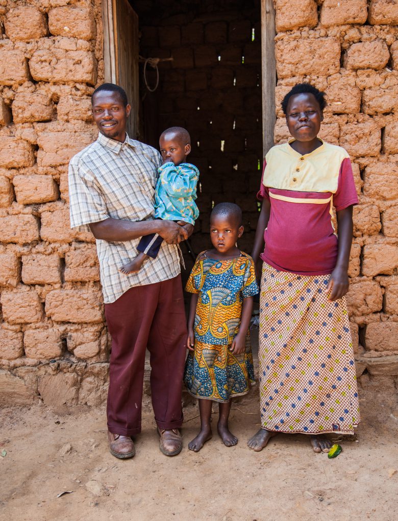 Family including a mother, father, and two young children, from Karongi district in Rwanda who participated in Program P that has been informed by IMAGES survey data